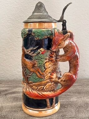 Vintage Lidded 9.5" Beer Stein w/ Fox
Handle & Lauren Music Box Works
Pewter Lid